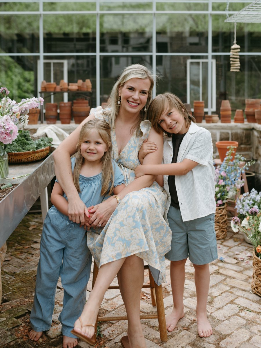 Rachel Wavra with her kids Livi and Jackson in the greenhouse